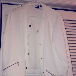 Only worn once! Chicos size 2 white with silver buttons and zippers